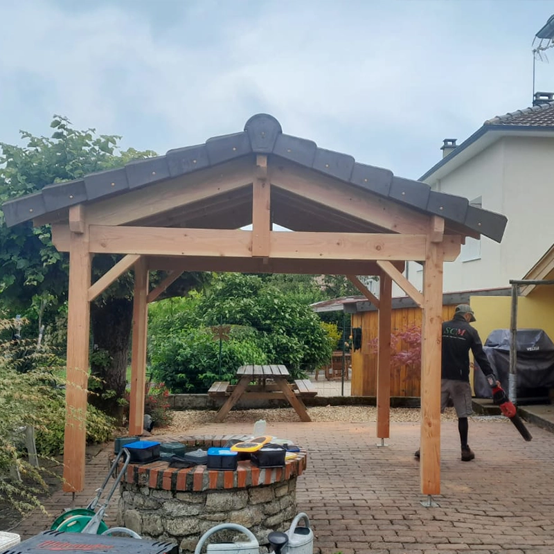 Fabrication d'un carport en bois sur-mesure, charpente en bois et toiture ardoise